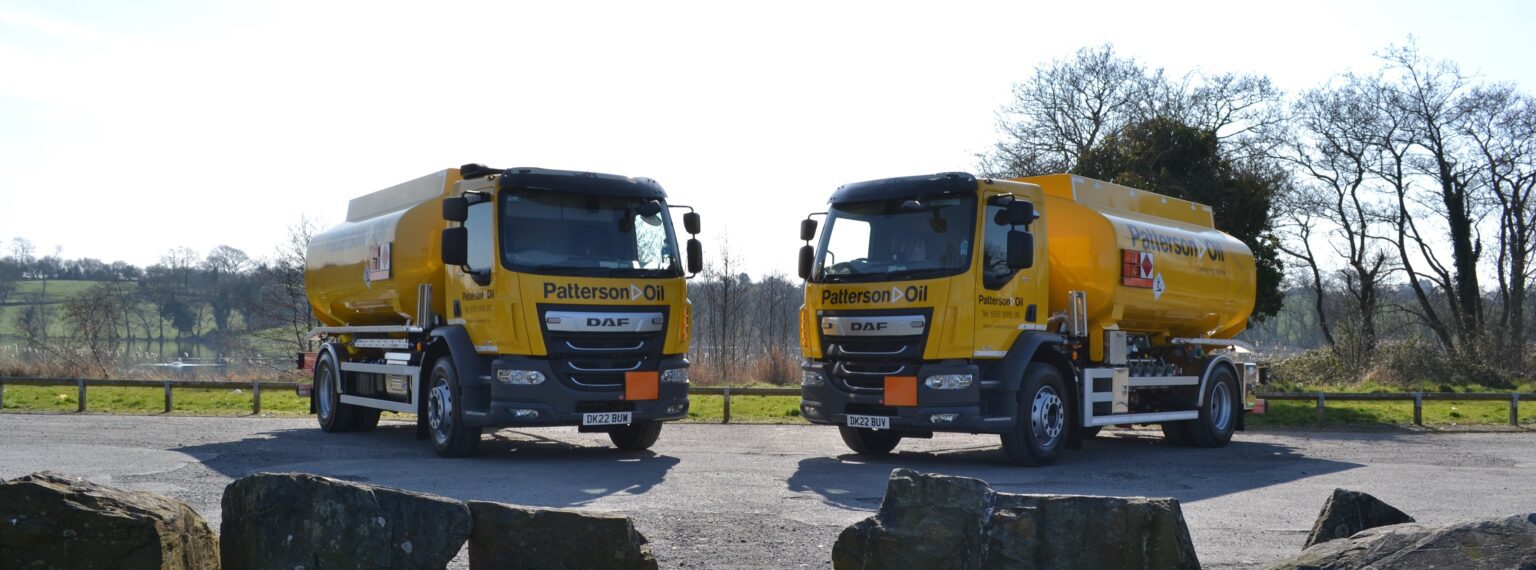 Two yellow Patterson Oil delivery tankers